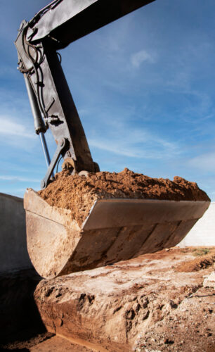 excavator-digging-ground-day-light